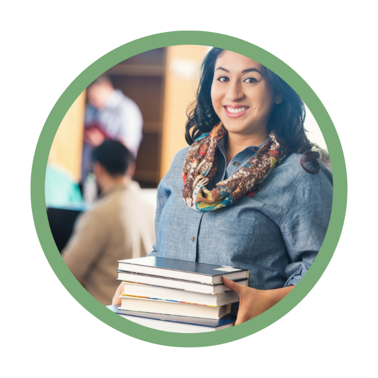 Girl with a scarf and a stack of books at school.